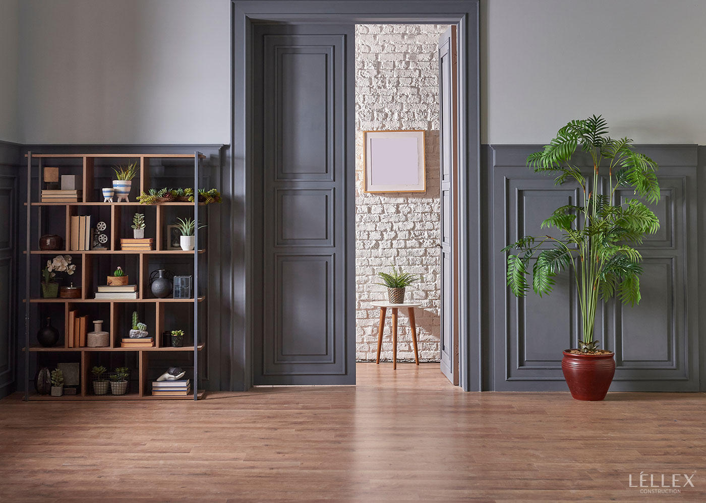 in the center a door on the sides a cabinet and a plant