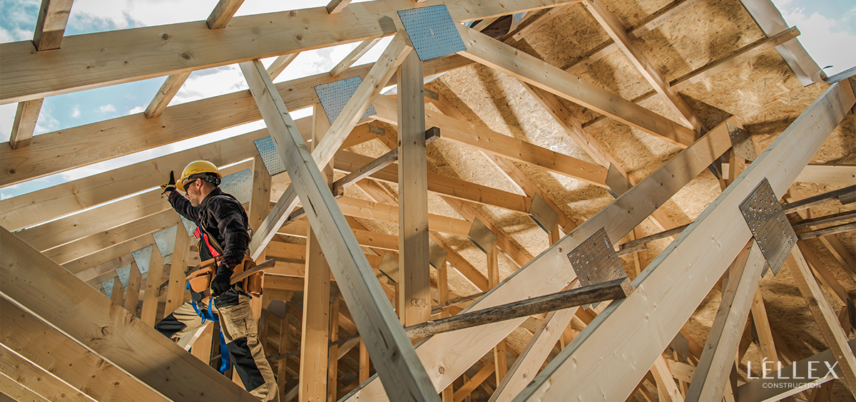 a builder builds a house frame