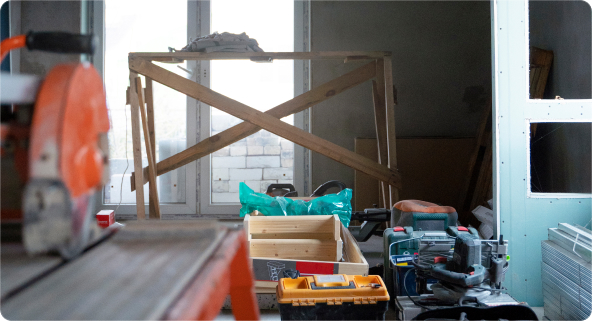 There's a bunch of home improvement tools on the floor. It's not a big mess.